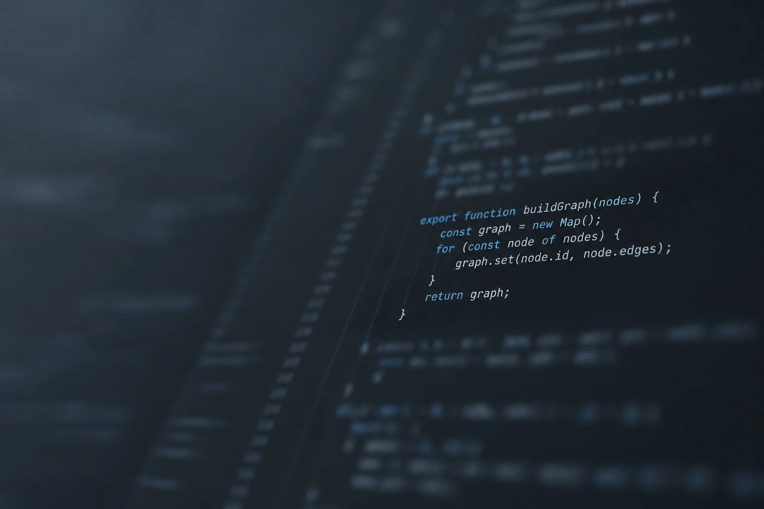 Illustrative source-code photograph with a JavaScript graph-building function in focus